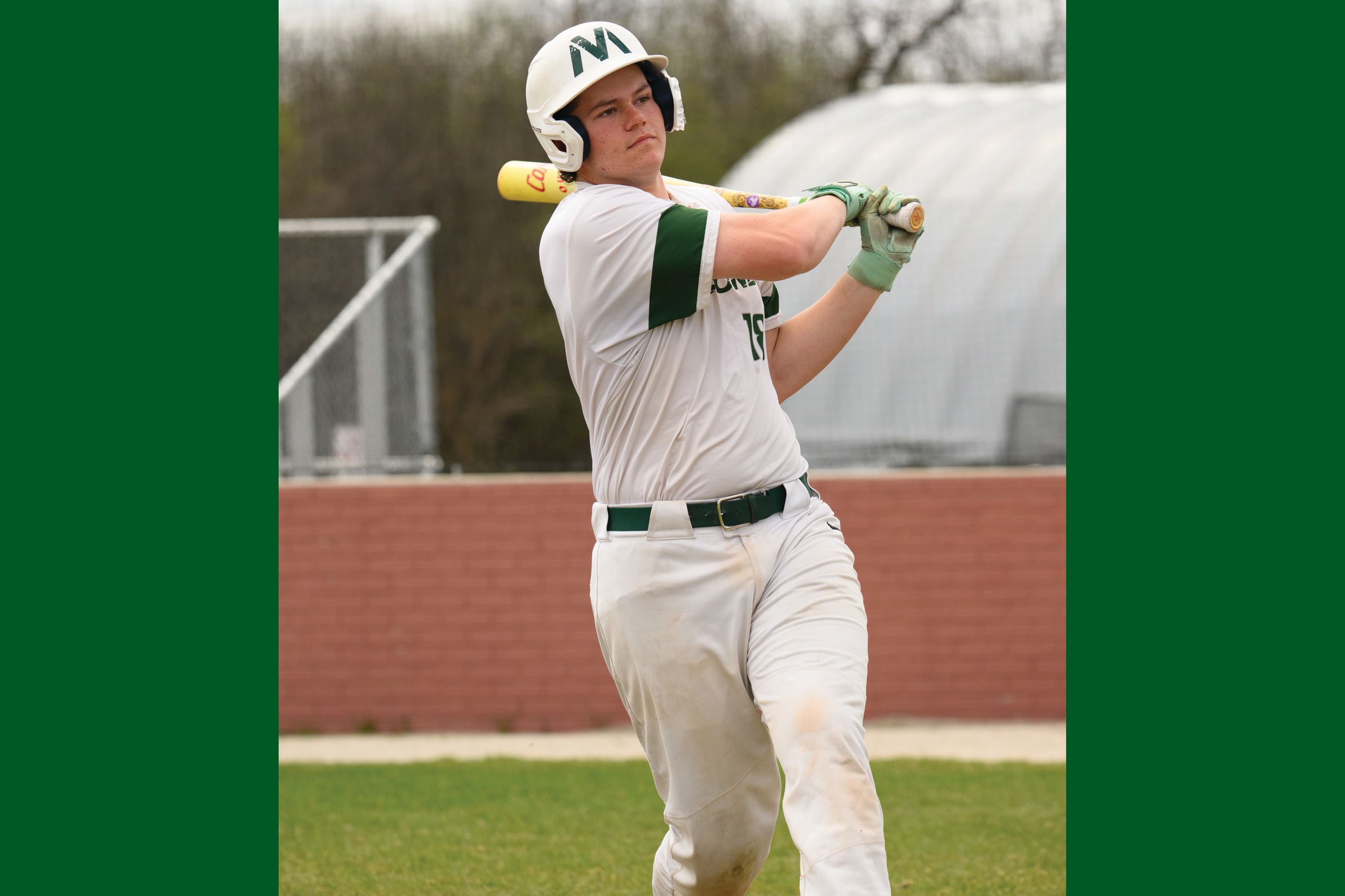 A Moraine Valley baseball batter hits the ball.